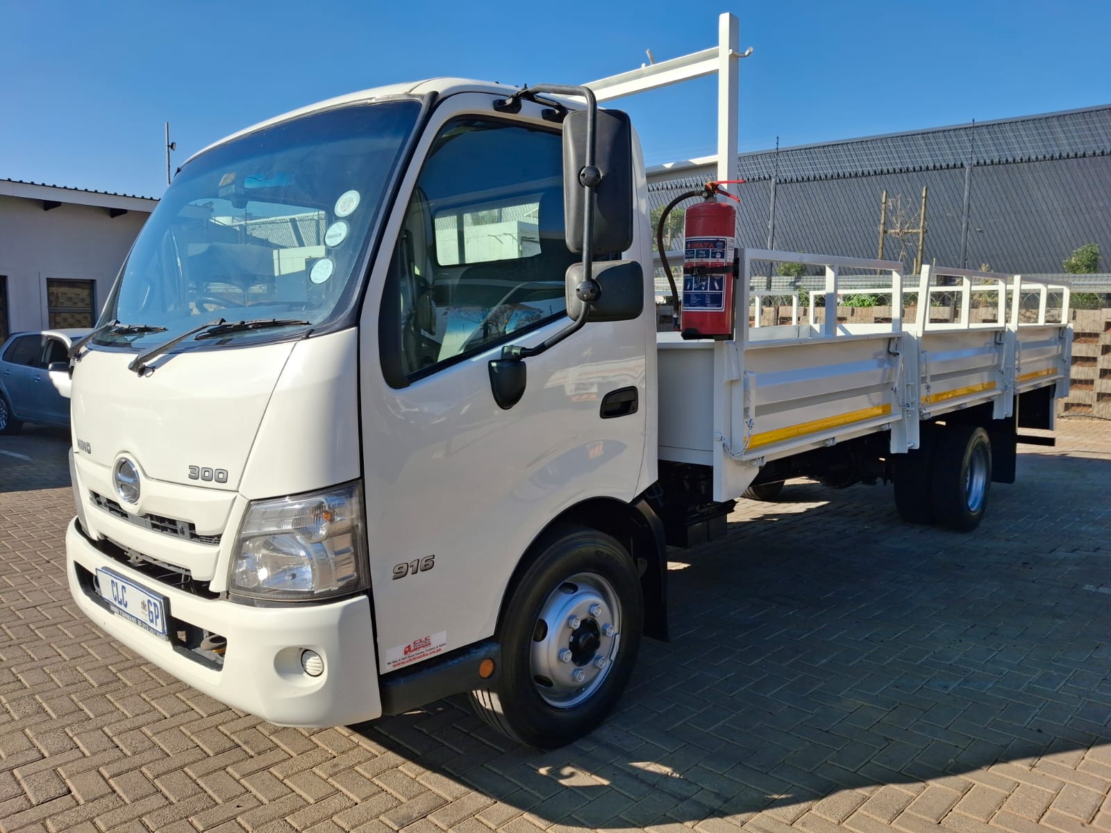 2021 Hino 300 916 4 Ton Dropside Featured Pose